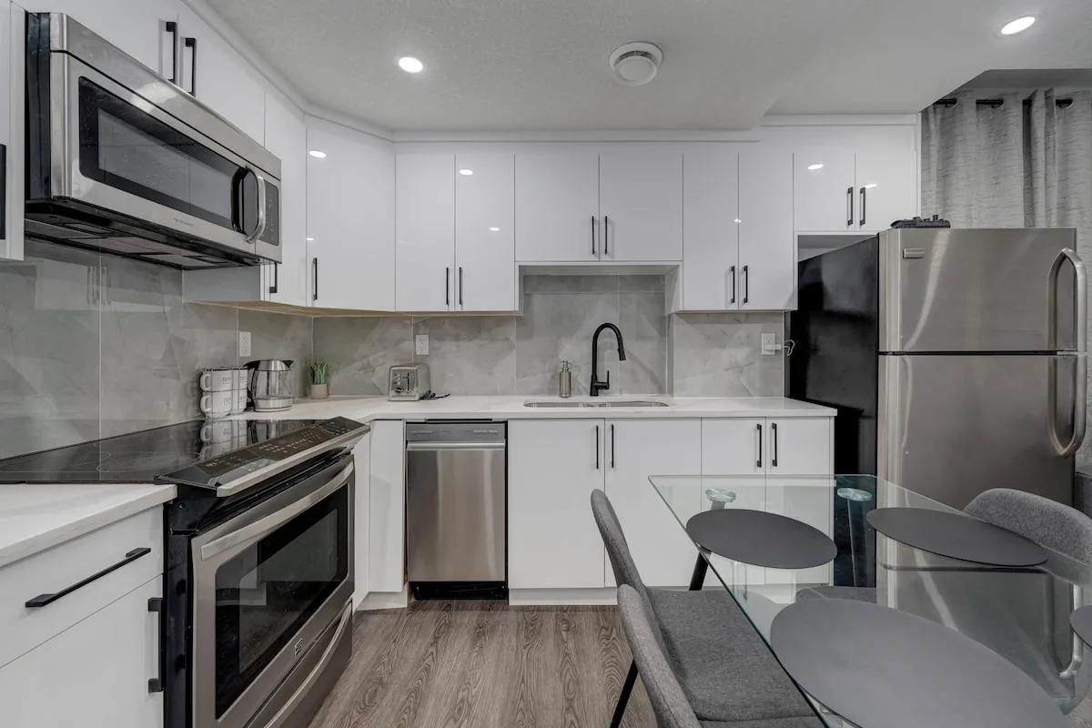 Full kitchen with stainless steel appliances