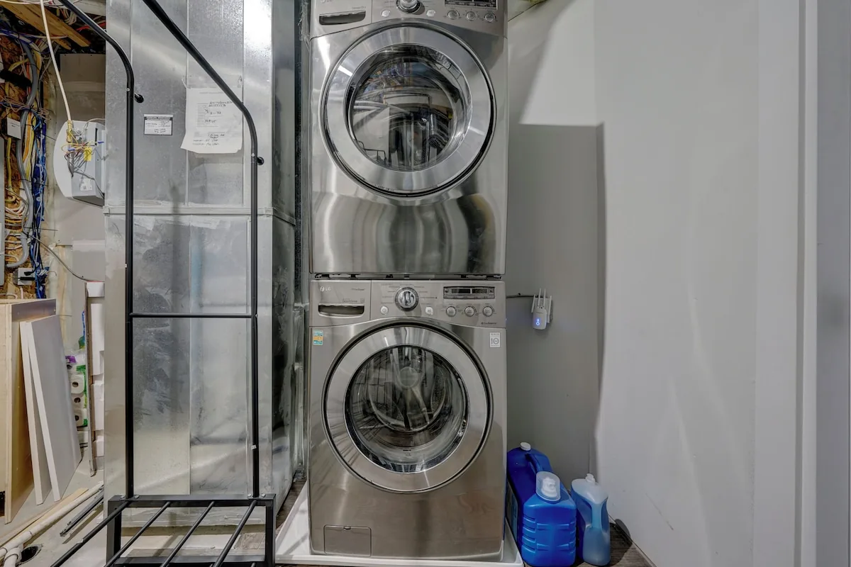 In-suite stacked washer and dryer